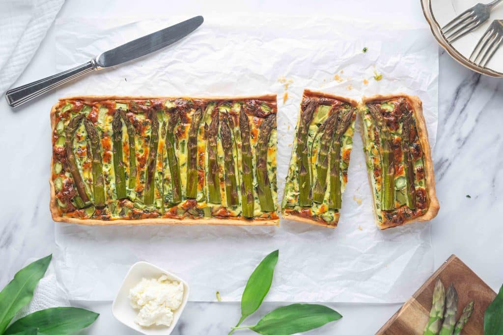 Quiche with green asparagus seen from above