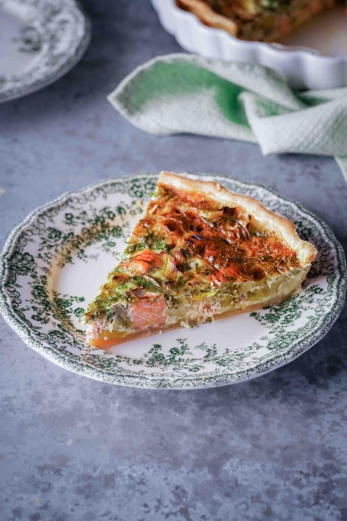 Zoom on a  slice of Fresh Salmon and Leek Quiche