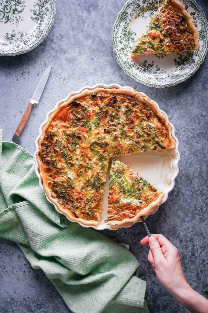 Zoom on a  slice of Fresh Salmon and Leek Quiche