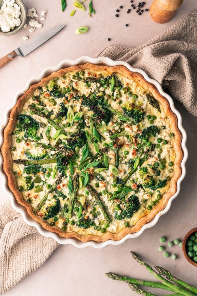 Spring quiche with asparagus, broccoli and peas