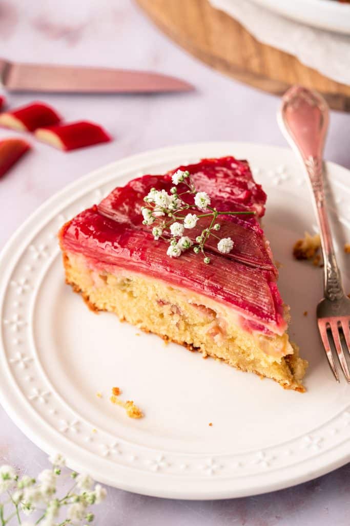 Piece of Easy Upside-Down Rhubarb Cake on a plate