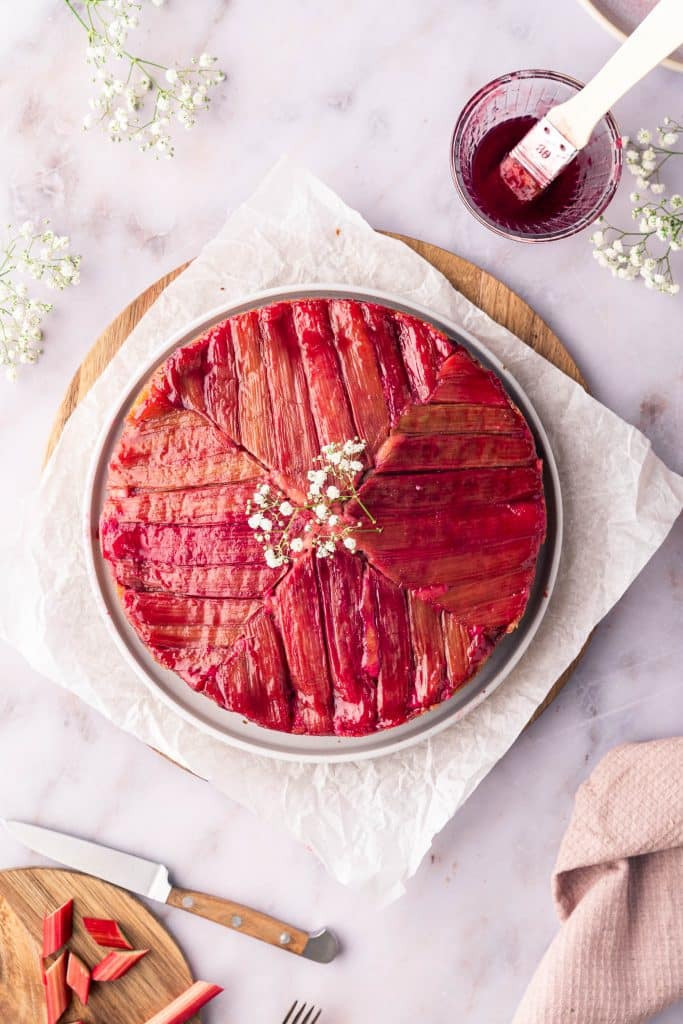 Top view of an Upside-Down Rhubarb Cake with a geometric pattern on top