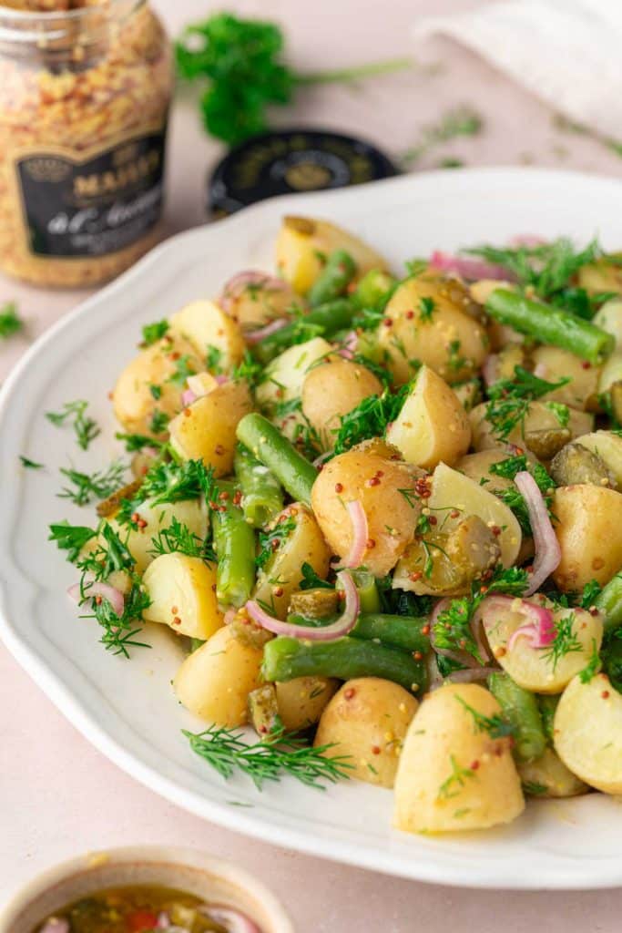 Zoom on a French potato salad with Dijon mustard vinaigrette