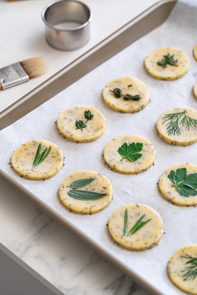 Homemade Herb and Parmesan Savory Cookies on a baking tray